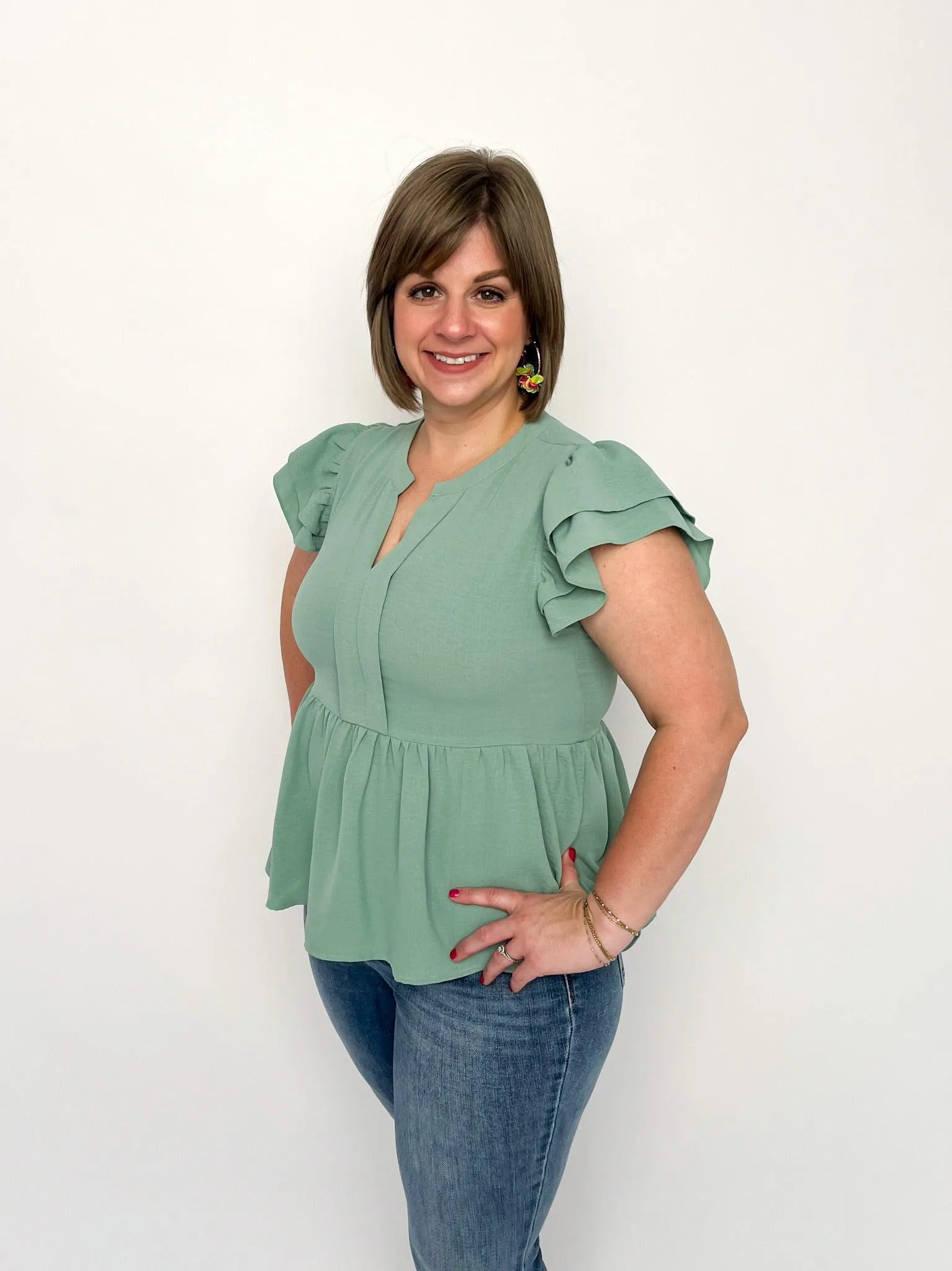 Aloe Peplum Top