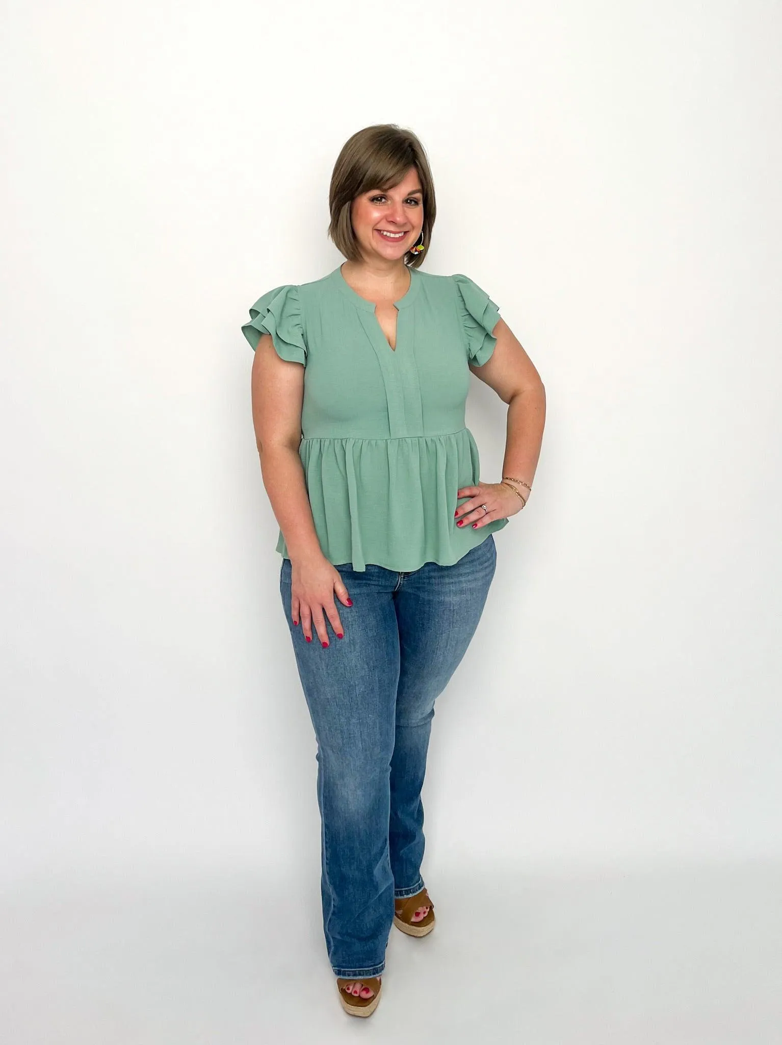 Aloe Peplum Top