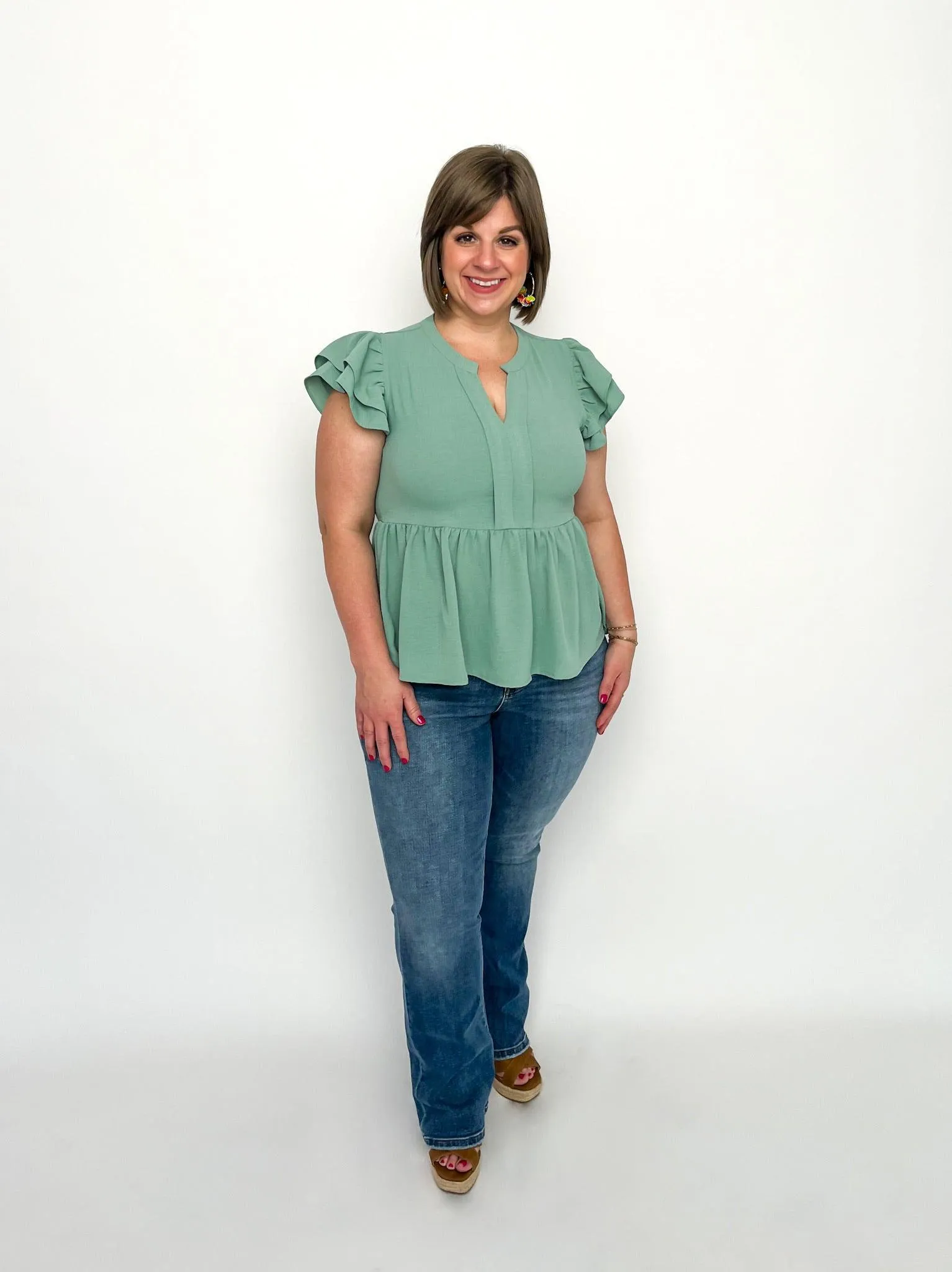 Aloe Peplum Top