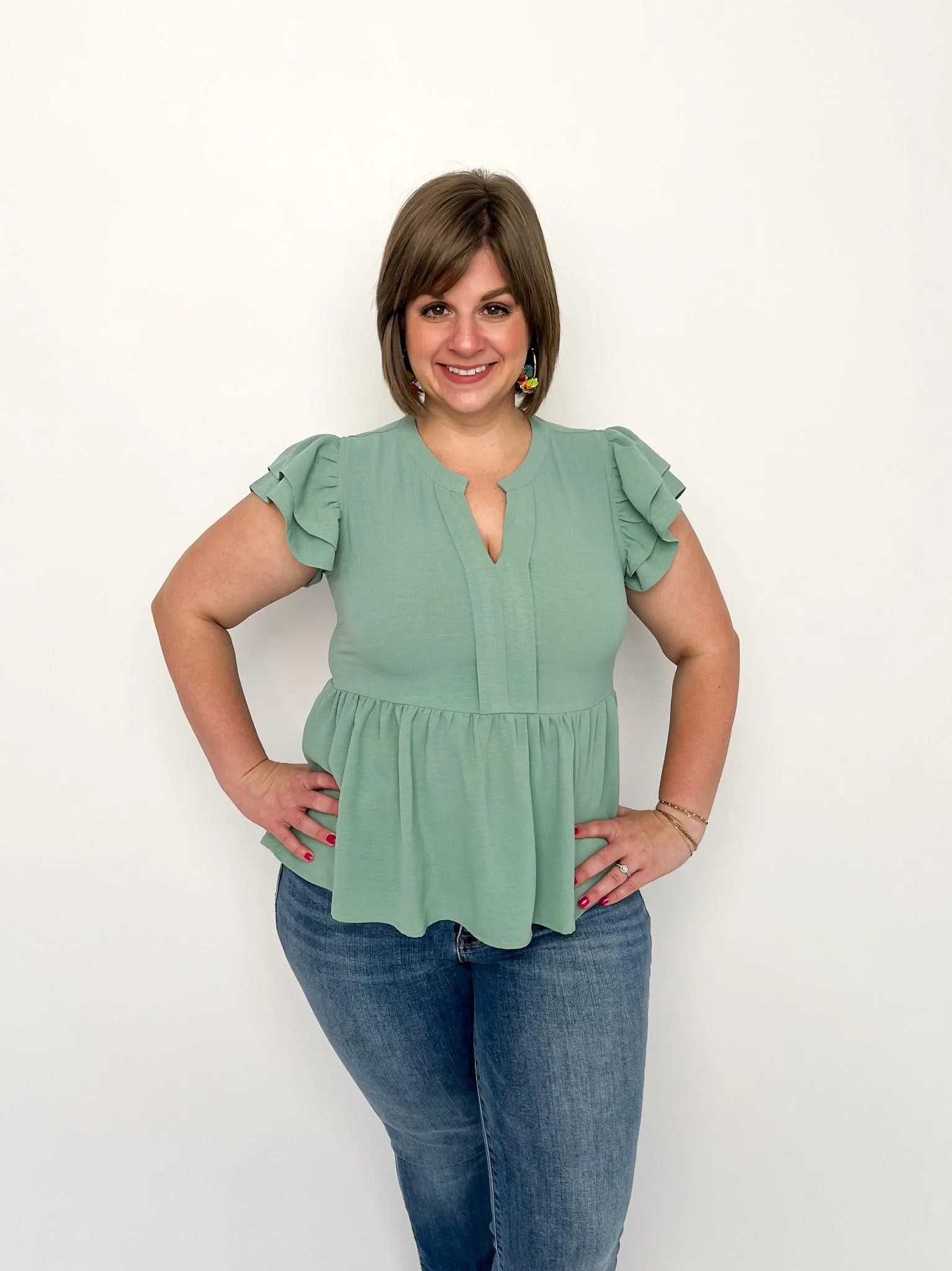 Aloe Peplum Top