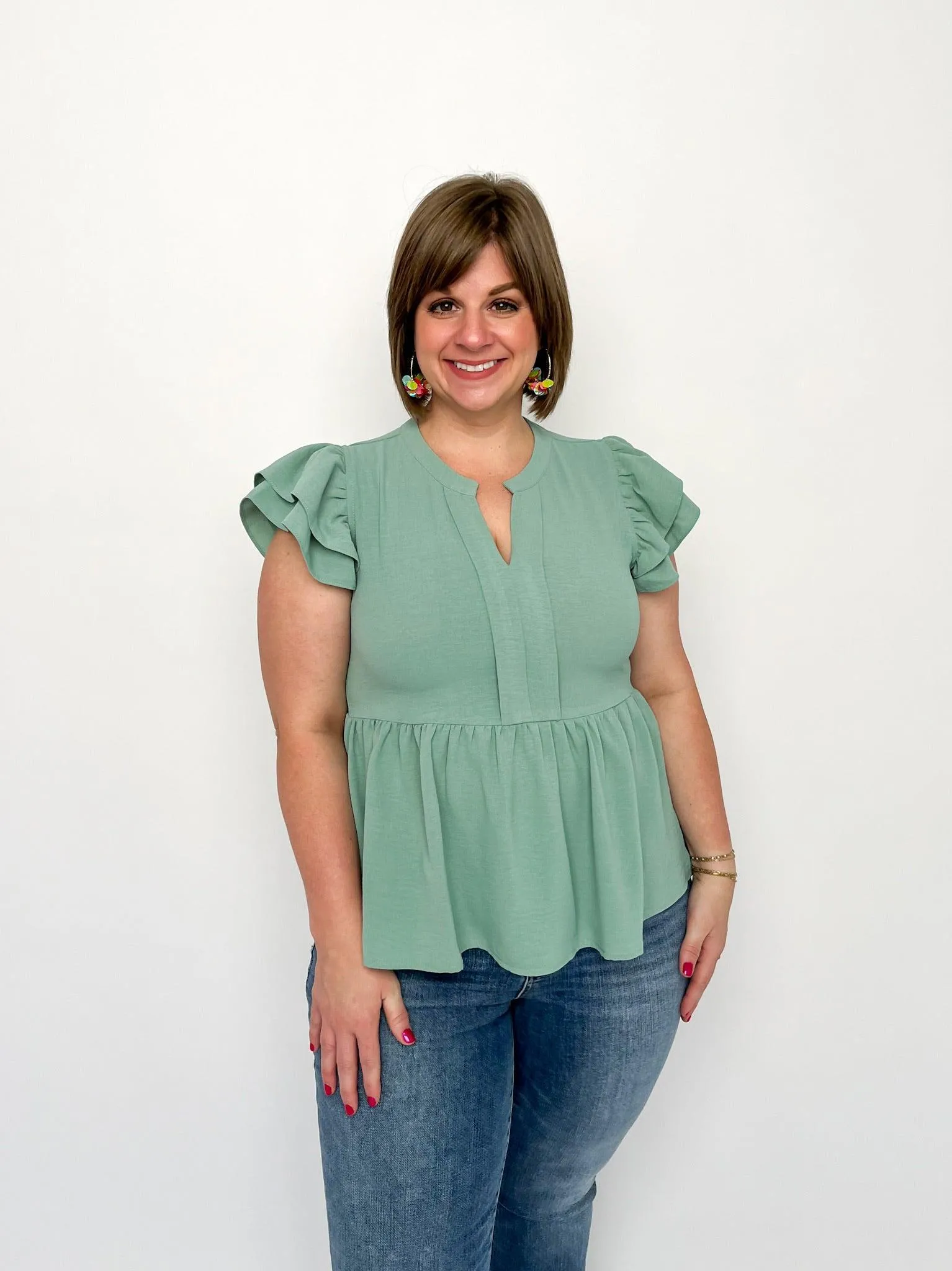 Aloe Peplum Top