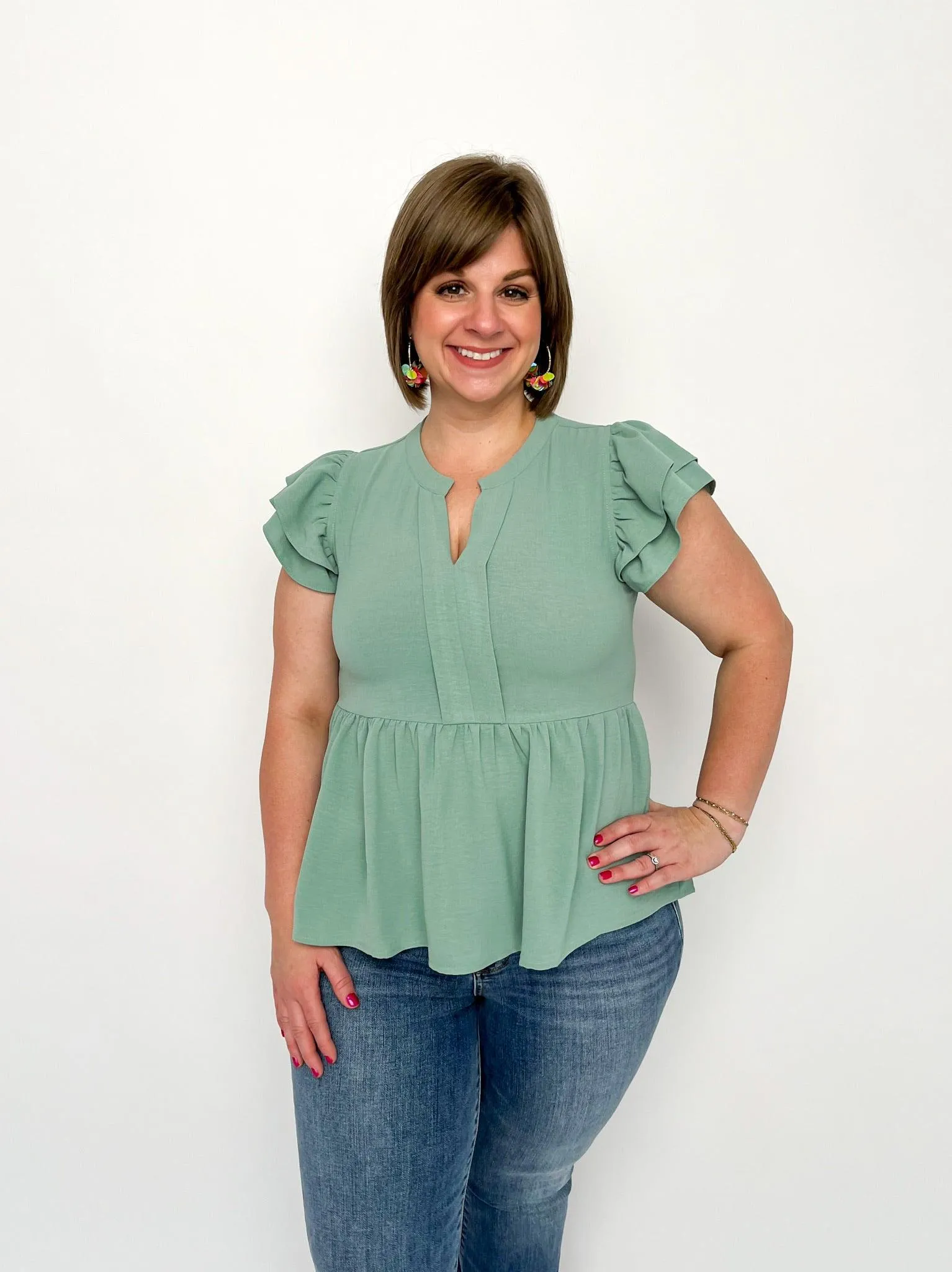 Aloe Peplum Top
