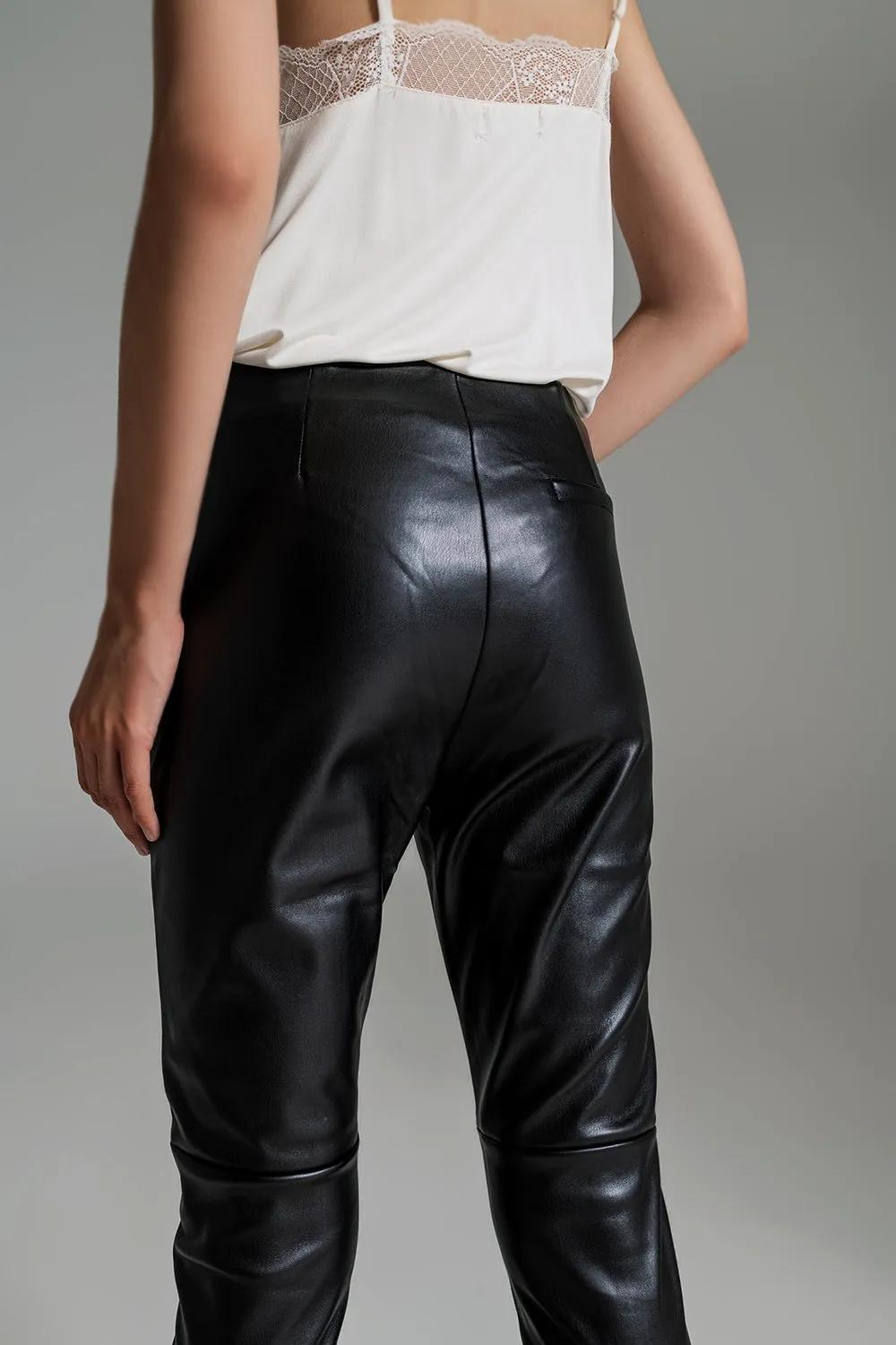 Black faux leather effect skinny pants
