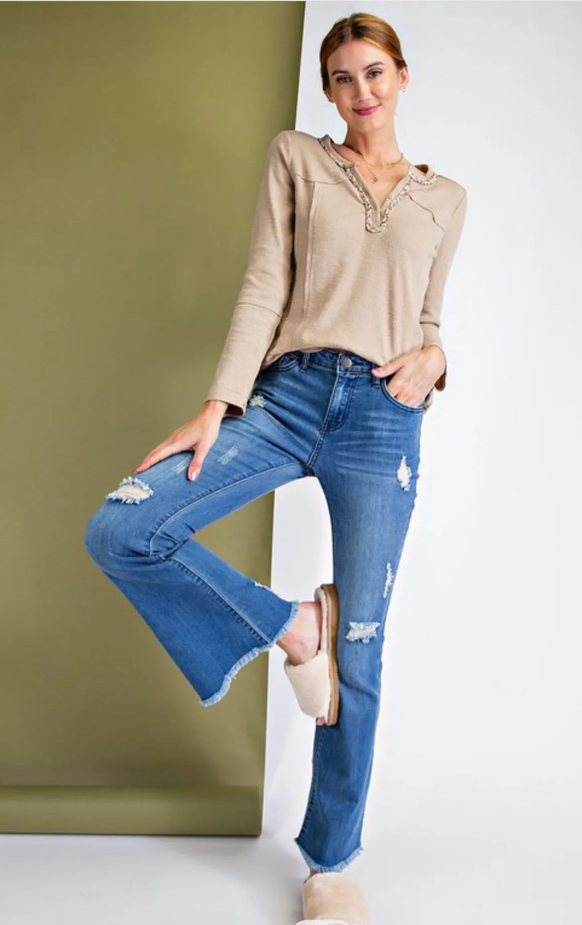 Distressed bell-bottom denim