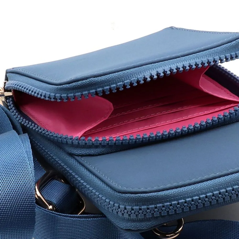 POM Recycled nylon denim blue phone bag